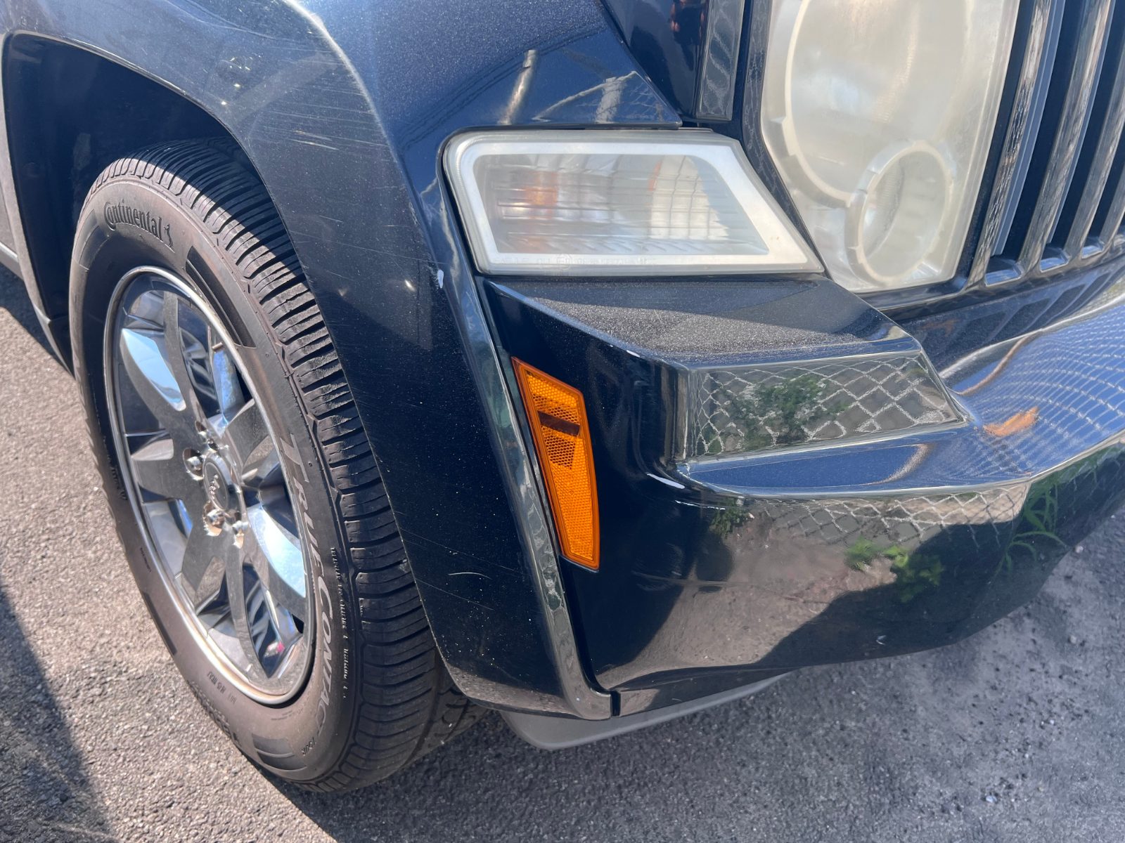 Front passenger bumper.