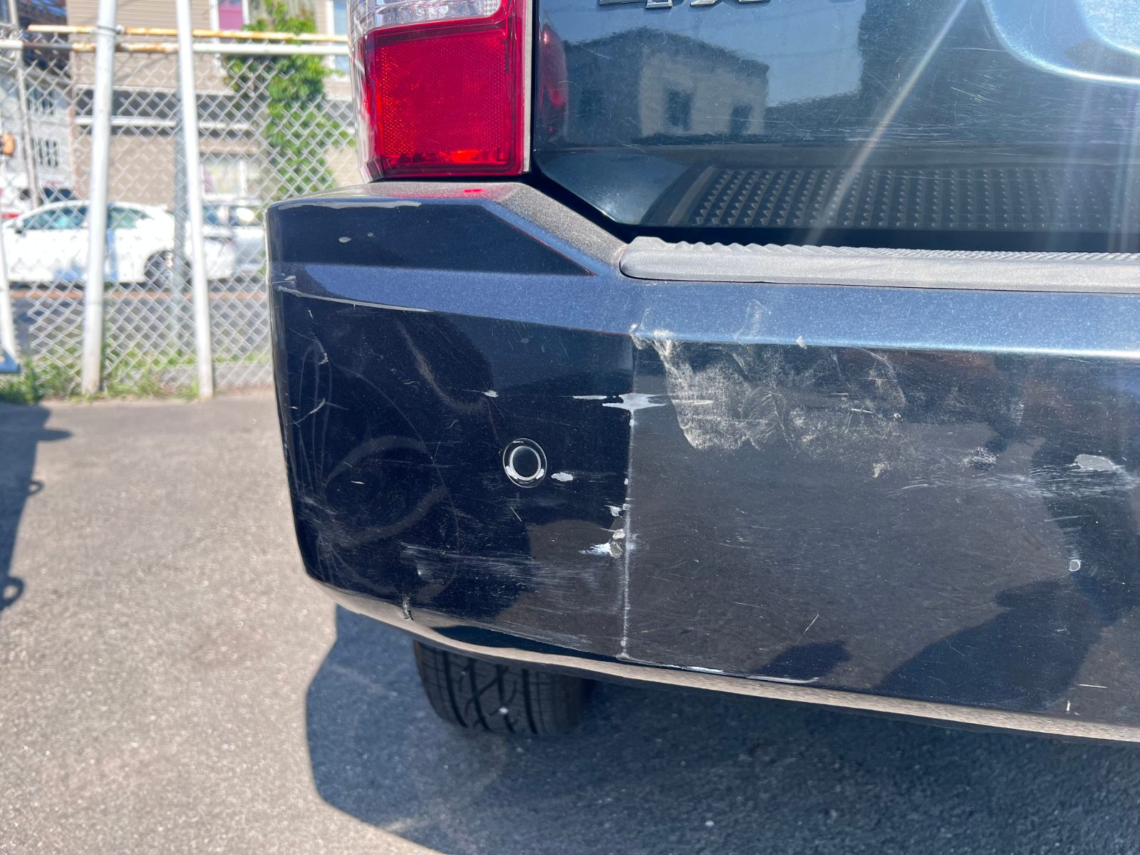 Rear driver bumper.